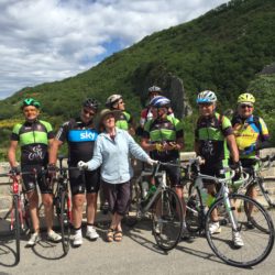 Nancy posing with cyclists practicing for Tour de France..