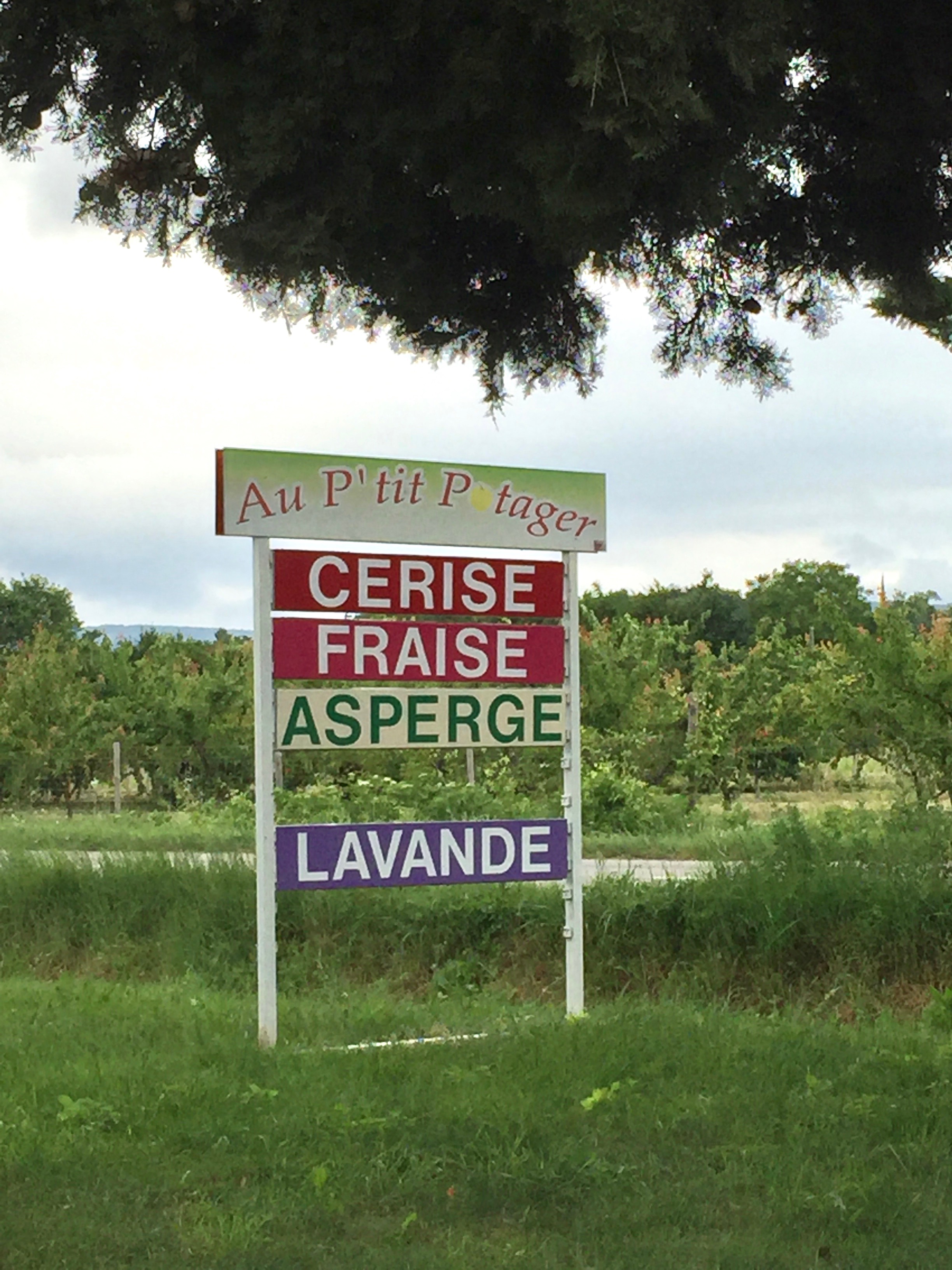 Sign of Au P'tit Potager farm stand in France