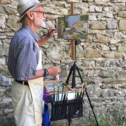 Tom painting bridge in town of Soau