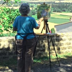 Ann painting view from Chateauneuf de Mazenc